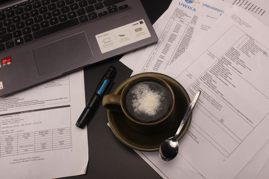A cup of coffee on a desk