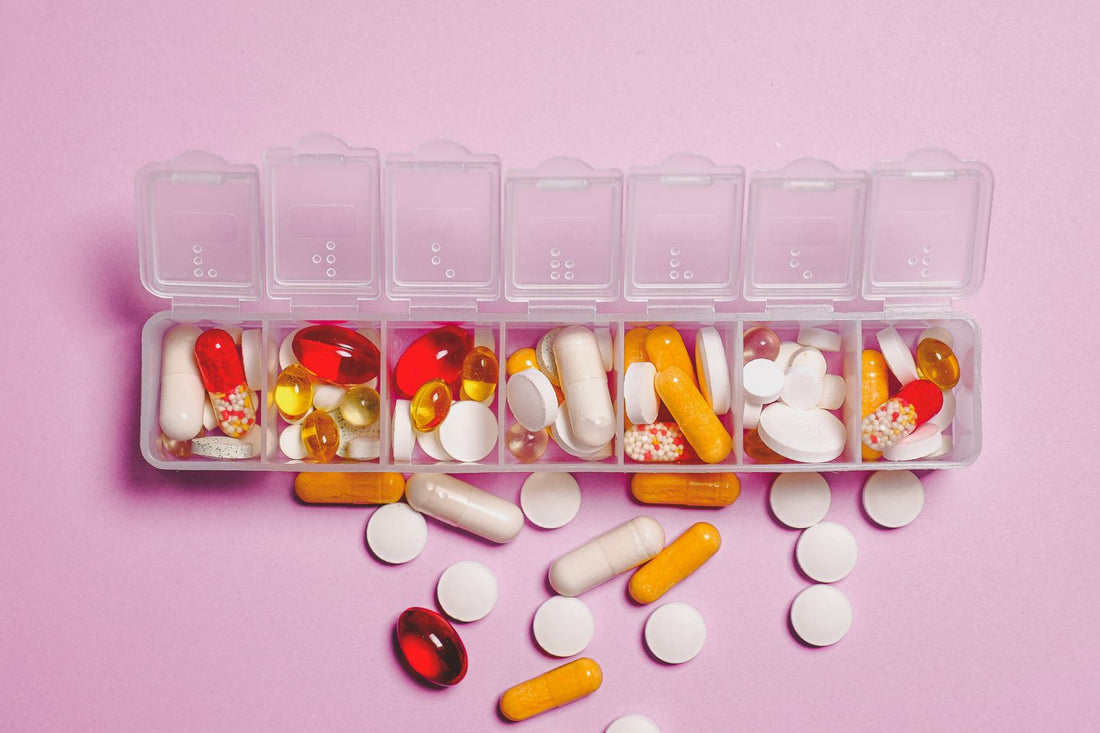 Dietary supplement capsules on a surface