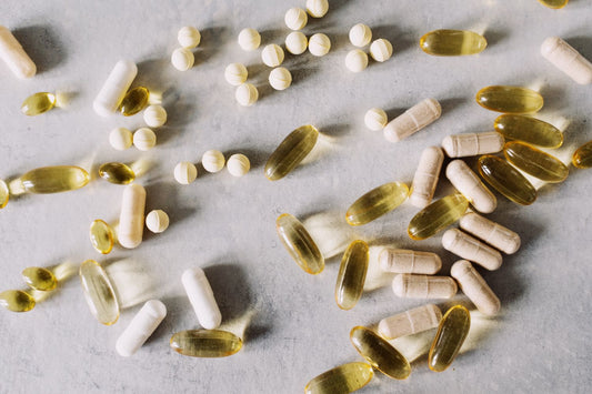 Supplement capsules on a surface